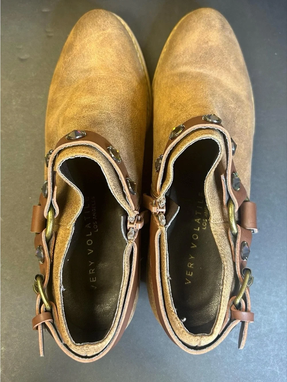 Woman’s Brown Leather Slip-On Boots with Decorative Gem Strap